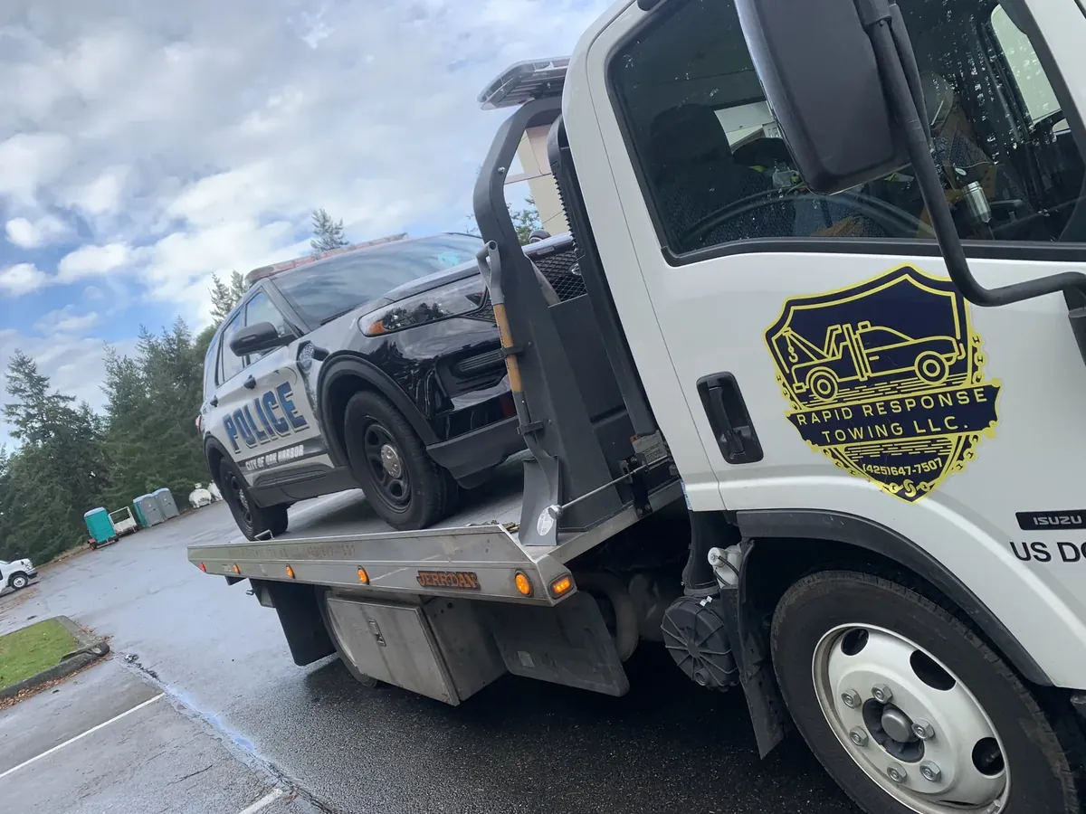 Vehicle loaded on a Rapid Response Towing truck